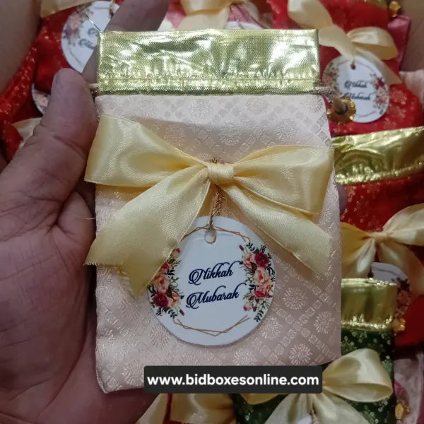 Jamawar pouches multi colours with bow